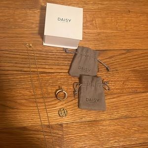 Daisy London long necklace with a coin.